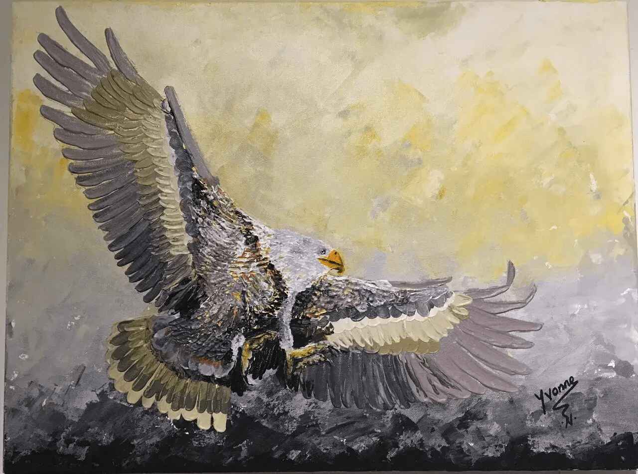 A painting of an eagle flying over rocks.